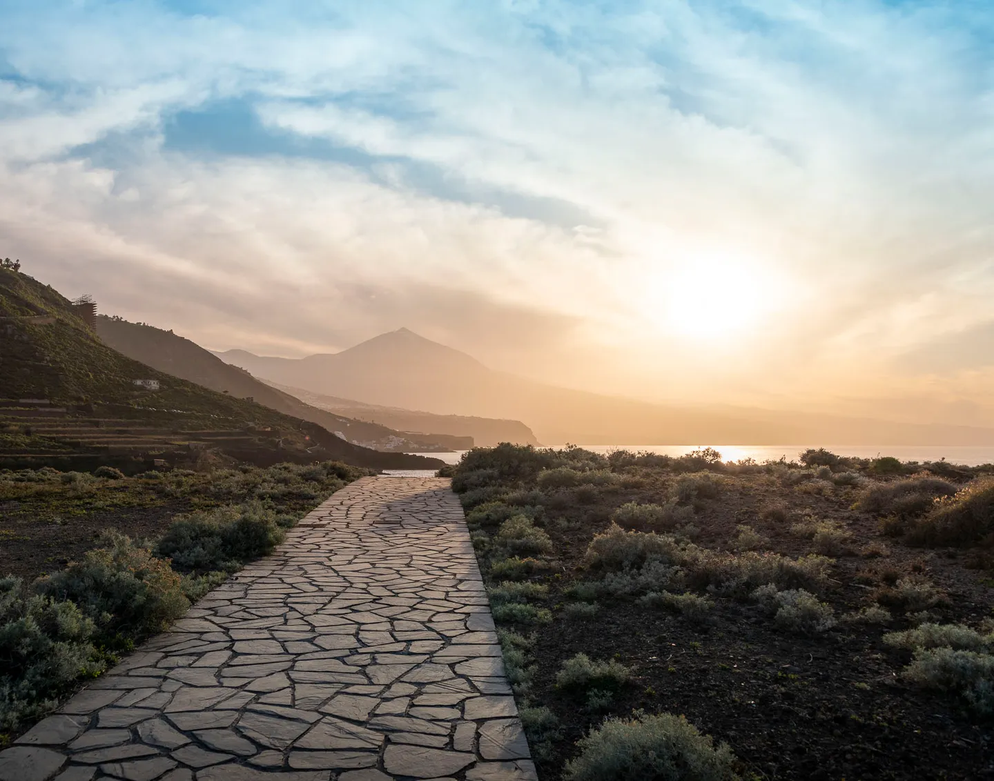A mountain road climbing through the El Teide landscape on Tenerife.